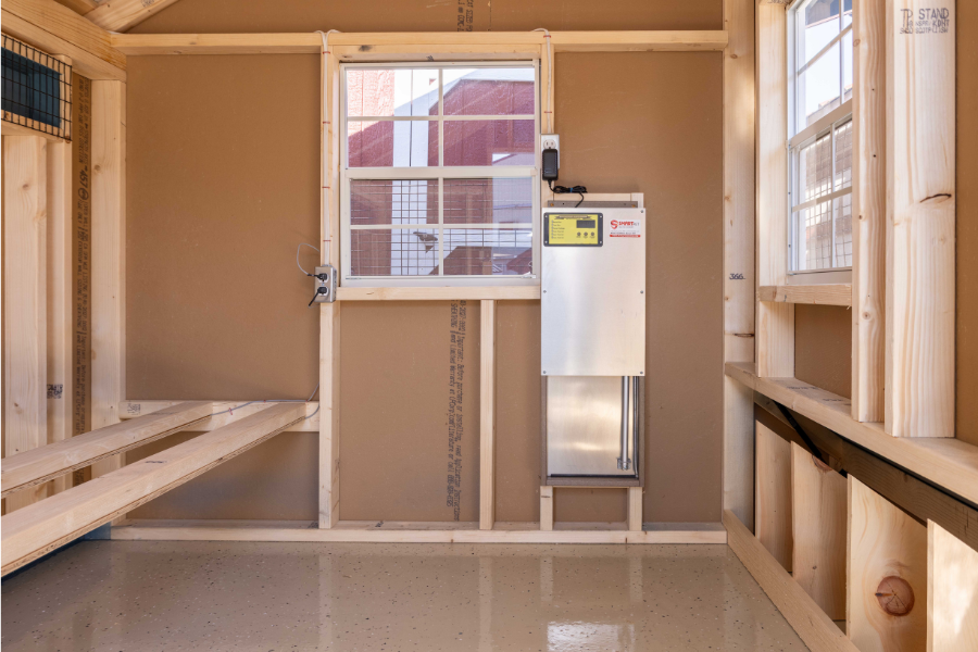 smart chicken door inside coop near roosting bars