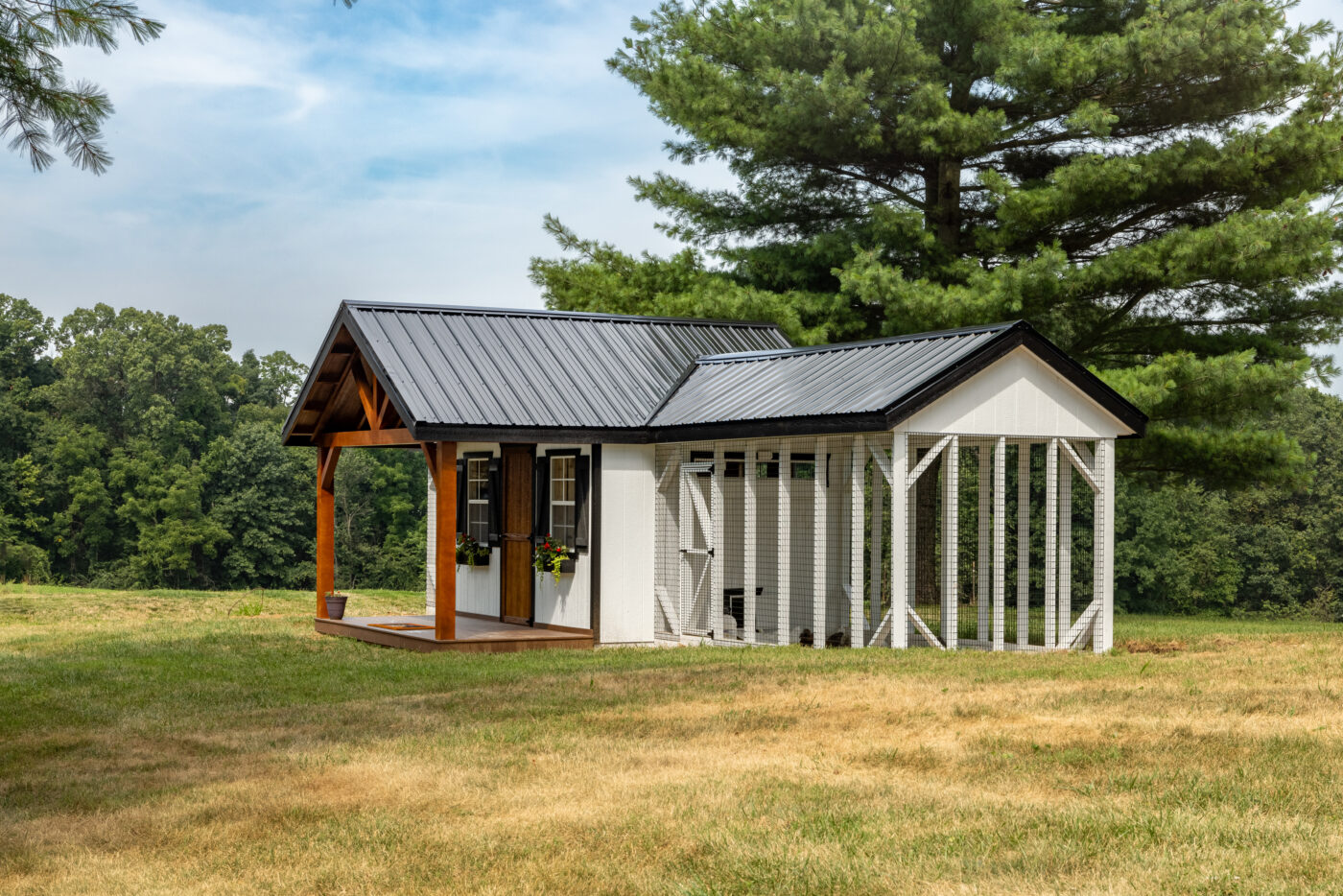 side view of combination chicken coop with front porch metal roof and outdoor run